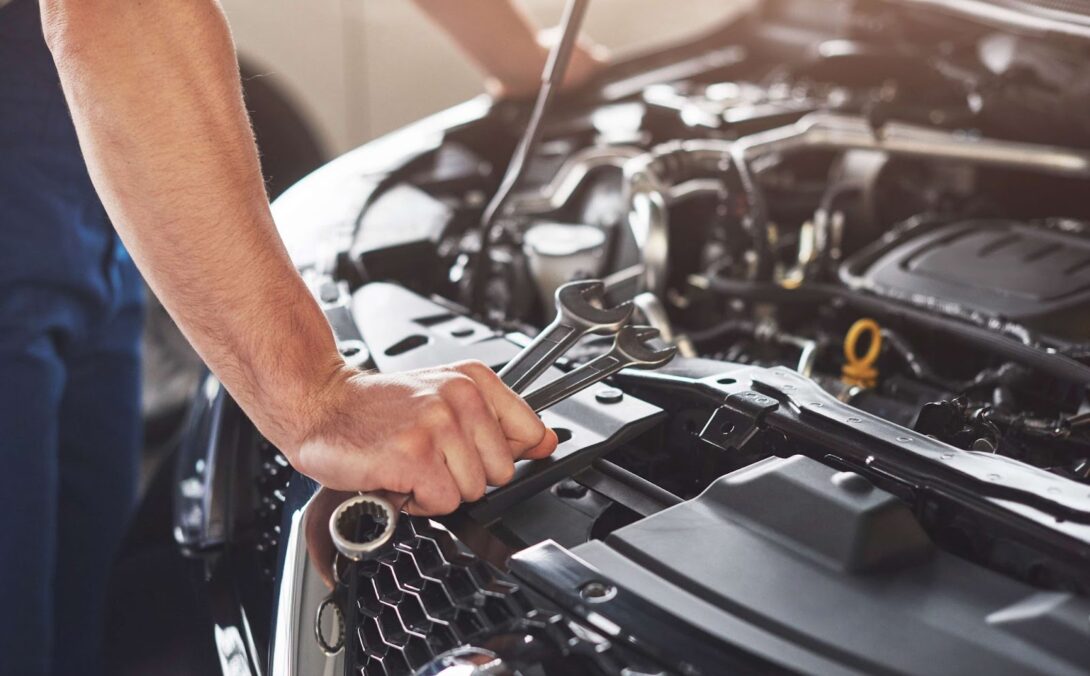 A man fixing an engine